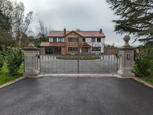 Amazing iron gate with intercom system.